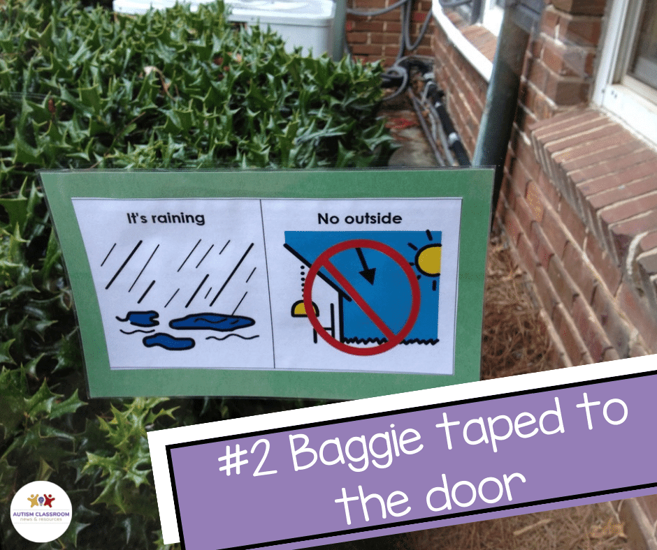 a visual showing rain-no playground on a glass door. #2 Baggie taped to the door 