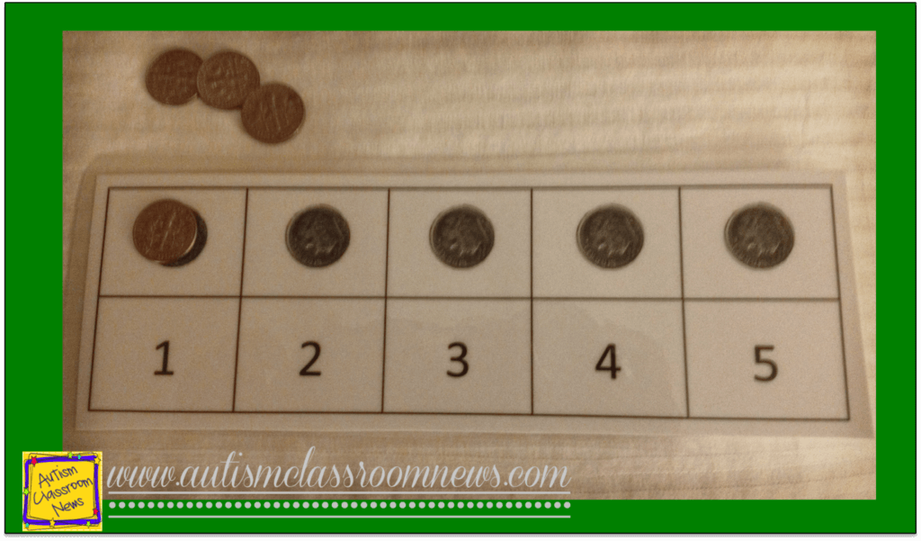 this is a jig for counting out 5 dimes as part of a structured work system for students with autism