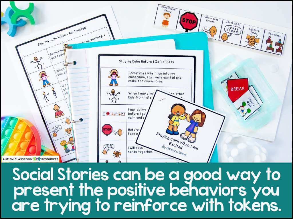 A collection of social stories materials, including illustrated guides, cards, a pop-it fidget toy, and tokens arranged on a table. Text reads: Social Stories can help reinforce positive behaviors as part of a classroom token system.